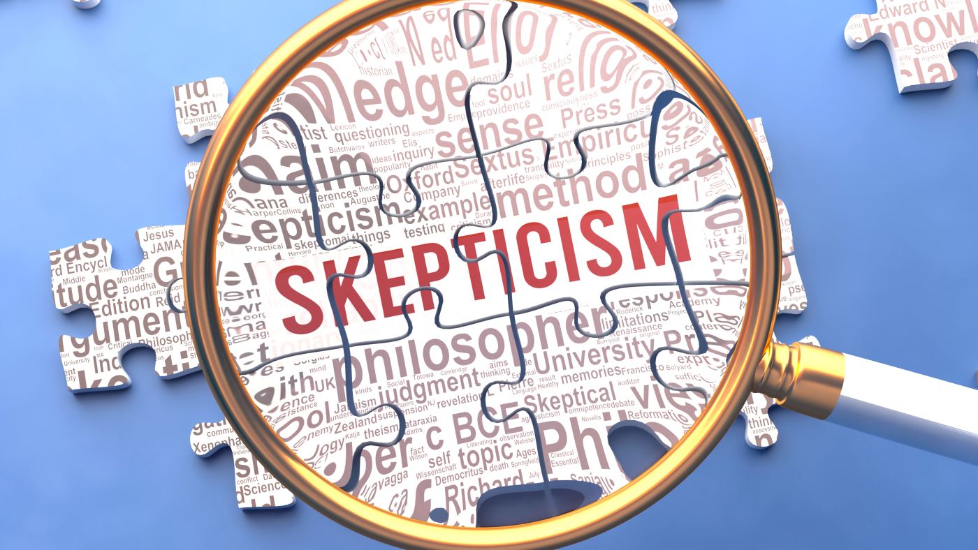A magnifying glass illuminating the word "skepticism"