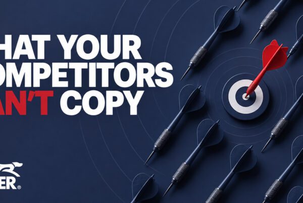 A red dart in a bullseye among dark darts beside the words “What your competitors can’t copy” and the RedRover logo.