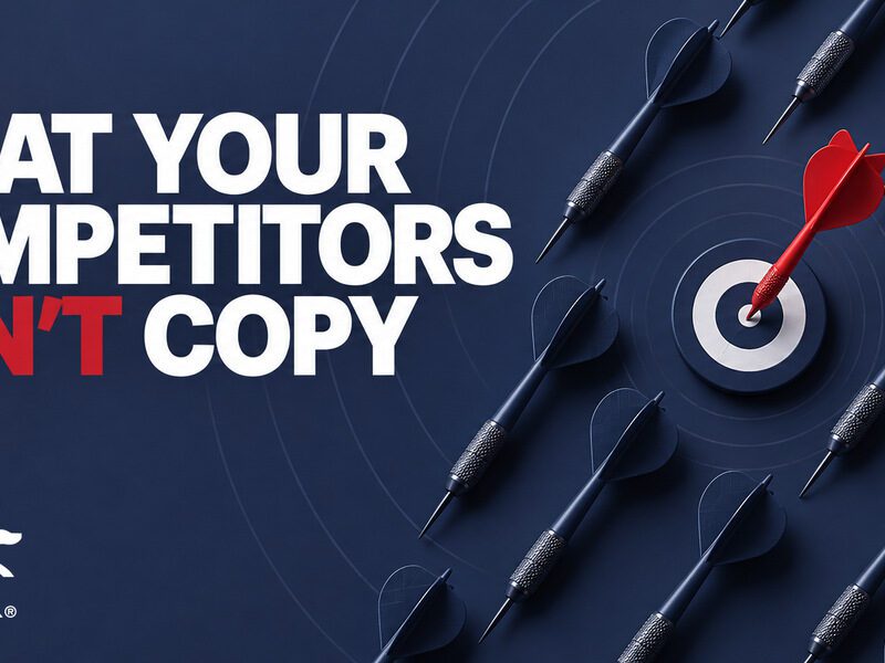 A red dart in a bullseye among dark darts beside the words “What your competitors can’t copy” and the RedRover logo.